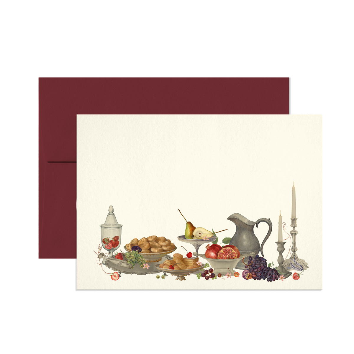 A rectangular cream-colored card featuring a vintage still life illustration with pastries, fruit, a pitcher, candles, and a glass jar, shown with a dark burgundy envelope behind it on a white background.